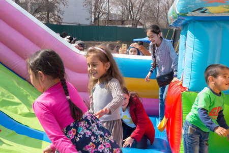 March 22, 2019 Almaty, Kazakhstan. Children playing during the celebration of Nauryz holidayのeditorial素材