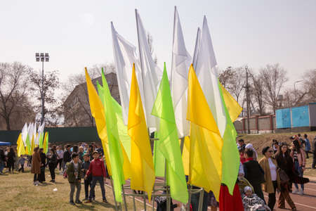 March 22, 2019 Almaty, Kazakhstan. Decorative colored flags stand during the celebration of the Nauryz holidayのeditorial素材