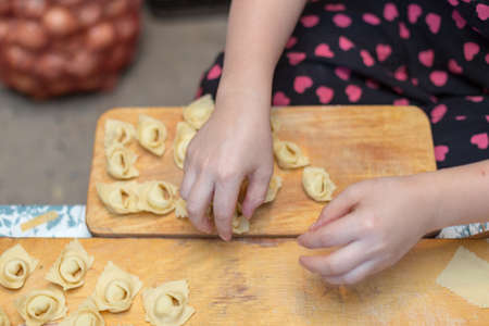 the process of cooking fried dumplings, Kazakhstan, the famous festive foodの写真素材