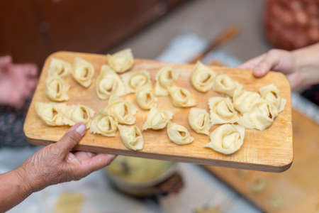 the process of cooking fried dumplings, Kazakhstan, the famous festive foodの写真素材