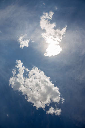 Clouds in the bright sky in the summerの写真素材