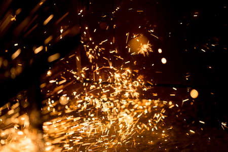Glowing Flow of Sparks in the Darkの写真素材