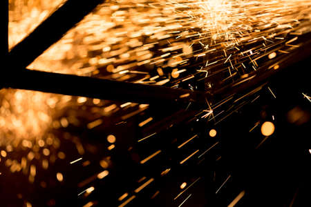 Glowing Flow of Sparks in the Darkの写真素材