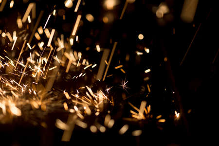 Glowing Flow of Sparks in the Darkの写真素材