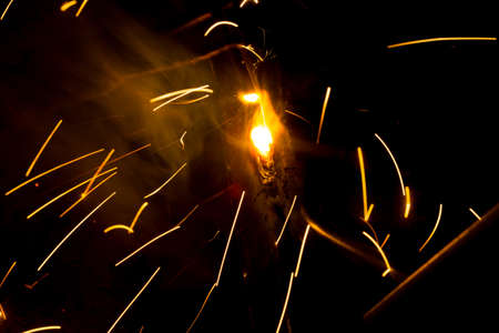 Welding sparks and smoke worker robotの写真素材