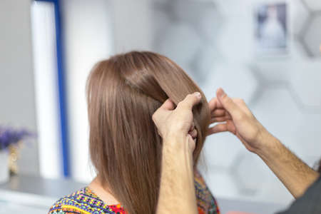 female head after lightening hair in a beauty salonの写真素材