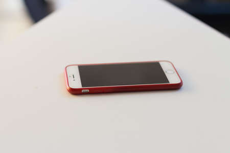 Smartphone on White table with space for your textの写真素材