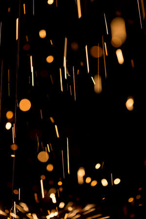 Glowing Flow of Sparks in the Darkの写真素材