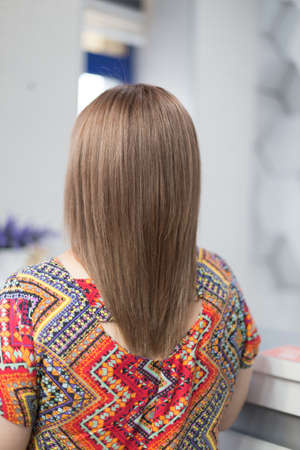 female head after lightening hair in a beauty salonの写真素材