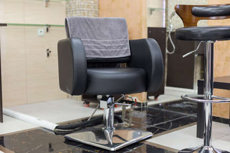 Stylish hairdressing chair in a beautiful interior. Theme for hairdressersの写真素材
