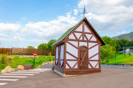 a beautiful wooden house for people in charge of security in a mountain pension so that they sit there and keep track of guests arriving at the resortの写真素材
