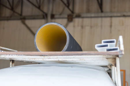 plumbing supply, a large plastic trunk pipe