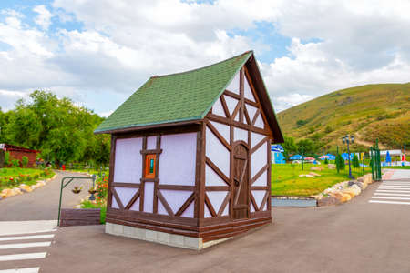 a beautiful wooden house for people in charge of security in a mountain pension so that they sit there and keep track of guests arriving at the resortの写真素材