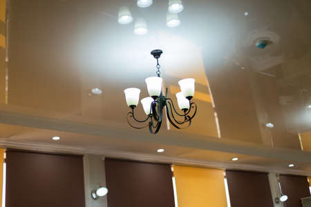 ceiling chandelier in a stylish beauty salon