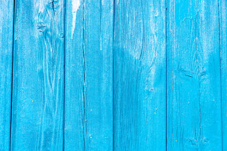Antique blue wood background texture with knots and holes. Old painted tree. Blue abstract background.の写真素材