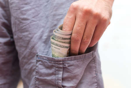 one hundred dollars banknote in your pocket.の写真素材