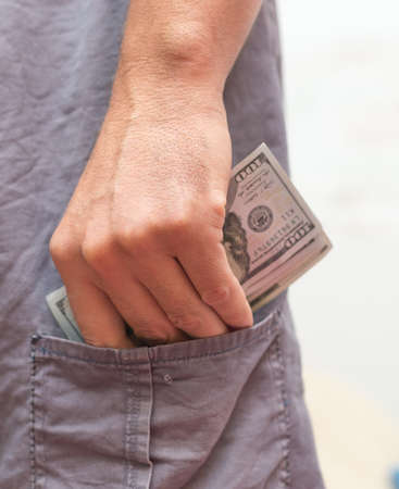 one hundred dollars banknote in your pocket.の写真素材