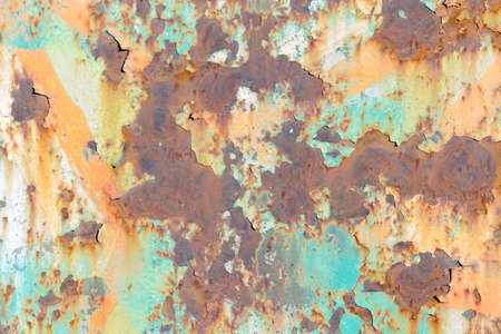 Rusty Colored Metal with cracked paint, grunge backgroundの写真素材