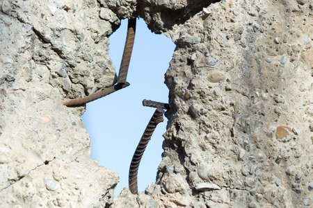 cracked concrete cement wall in industrial building, great for your design and texture backgroundの写真素材