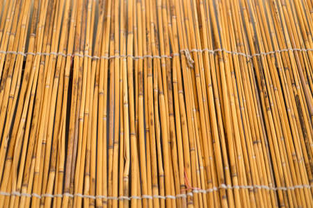 Cane background. Traditional bamboo cane fence. Asian styleの写真素材