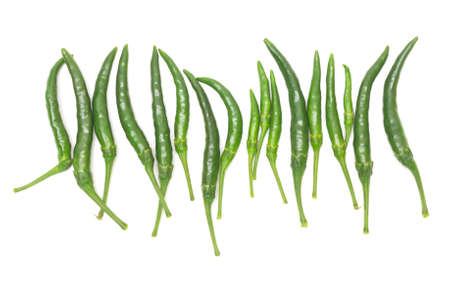 Fresh green chili peppers. Isolated on a white background.の写真素材