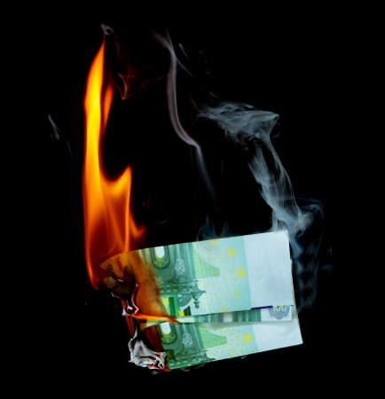 100 euro burns on a black backgroundの写真素材
