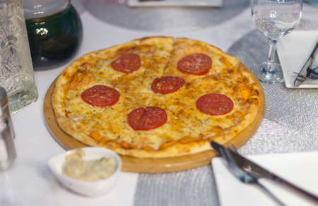 pizza on the festive tableの写真素材