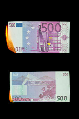 500 euro burns on a black background, both sidesの写真素材