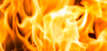 Fire flame burning glowing on black dark background, hot heat energy fuel fire motion pattern...