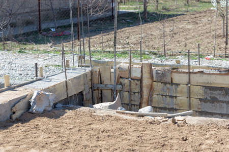 Formwork for the foundation of the house. Close-up of the foundation of a house made of concrete...