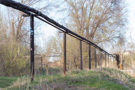 A pipeline above the ground that conducts heat to heat a city.の写真素材