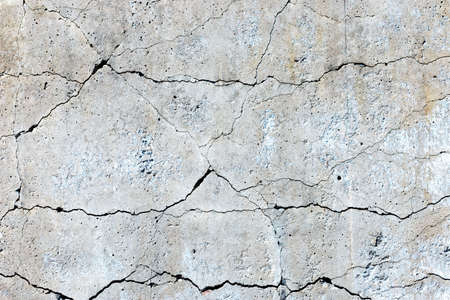 concrete cracked cement wall in industrial building, great for your design and background textureの写真素材