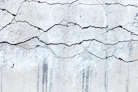 concrete cracked cement wall in industrial building, great for your design and background textureの写真素材