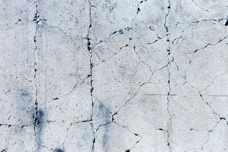 concrete cracked cement wall in industrial building, great for your design and background textureの写真素材