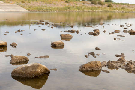 Discharge of water from a dam into a river