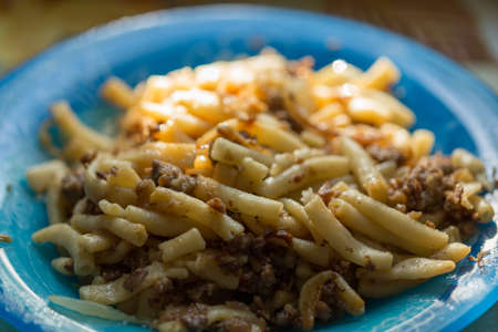 abstract background mountain stones in the valley of the road, man dug a road between stones in the highlands and formed the walls of beautiful pebblesの写真素材
