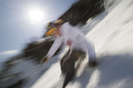 Motion blurred image of an expert skier, Stowe, VT, USAの写真素材
