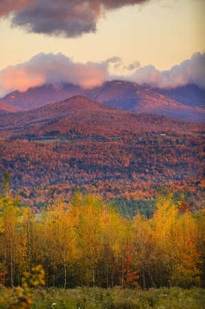 Fall foliage landscape with Mt  Mansfield in the background, Stowe, Vermont, USAの写真素材