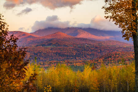 Fall foliage landscape with Mt  Mansfield in the background, Stowe, Vermont, USAの写真素材