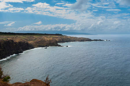 Scenic volcanic cliff coastline on Maui, Hawaii, USAの写真素材