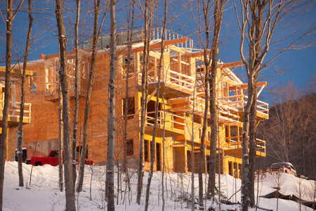 Construction on a mountain cabin in  the winter, Stowe Vermont, USAの写真素材