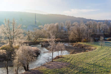 Stowe Community Church on a cold frosty fall morning in Stowe Vermont USAの写真素材