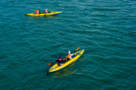Tourists in inflatable ocean kayaks, Hornsund, Norwayのeditorial素材