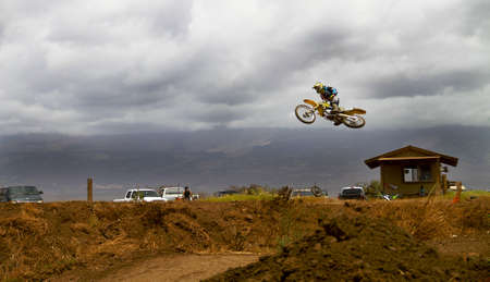 Motocross bike getting air off a jumpの写真素材