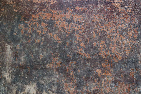 Old stone wall with black and orange texture