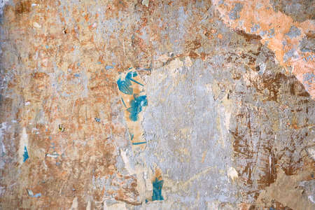 very ancient surface of a damaged wall with broken abstract texture - vertical background wallpaper