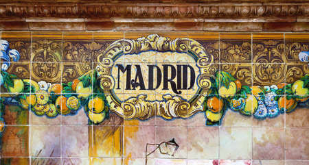 Tile with the name of the spanish city of Jaen on ceramic with a colorful decoration located in Spain Square in Sevilleのeditorial素材