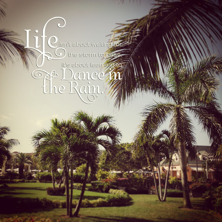Inspirational Typographic Quote: life isnt about waiting for the storm to pass itの写真素材