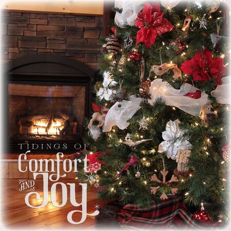 instagram of beautiful christmas tree and cottage fireplaceの写真素材