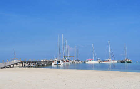 stock photo of beautiful carribean boat dockの写真素材